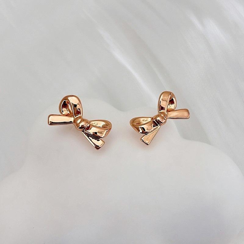 Rose Gold Bow Stud Earrings Light Luxury Fashion Trend Temperament Earrings Fresh And Sweet Versatile High-End Earrings
Rose Gold Bow Stud Earrings Light Luxury Fashion Trend Temperament Earrings Fresh And Sweet Versatile High-End Earrings