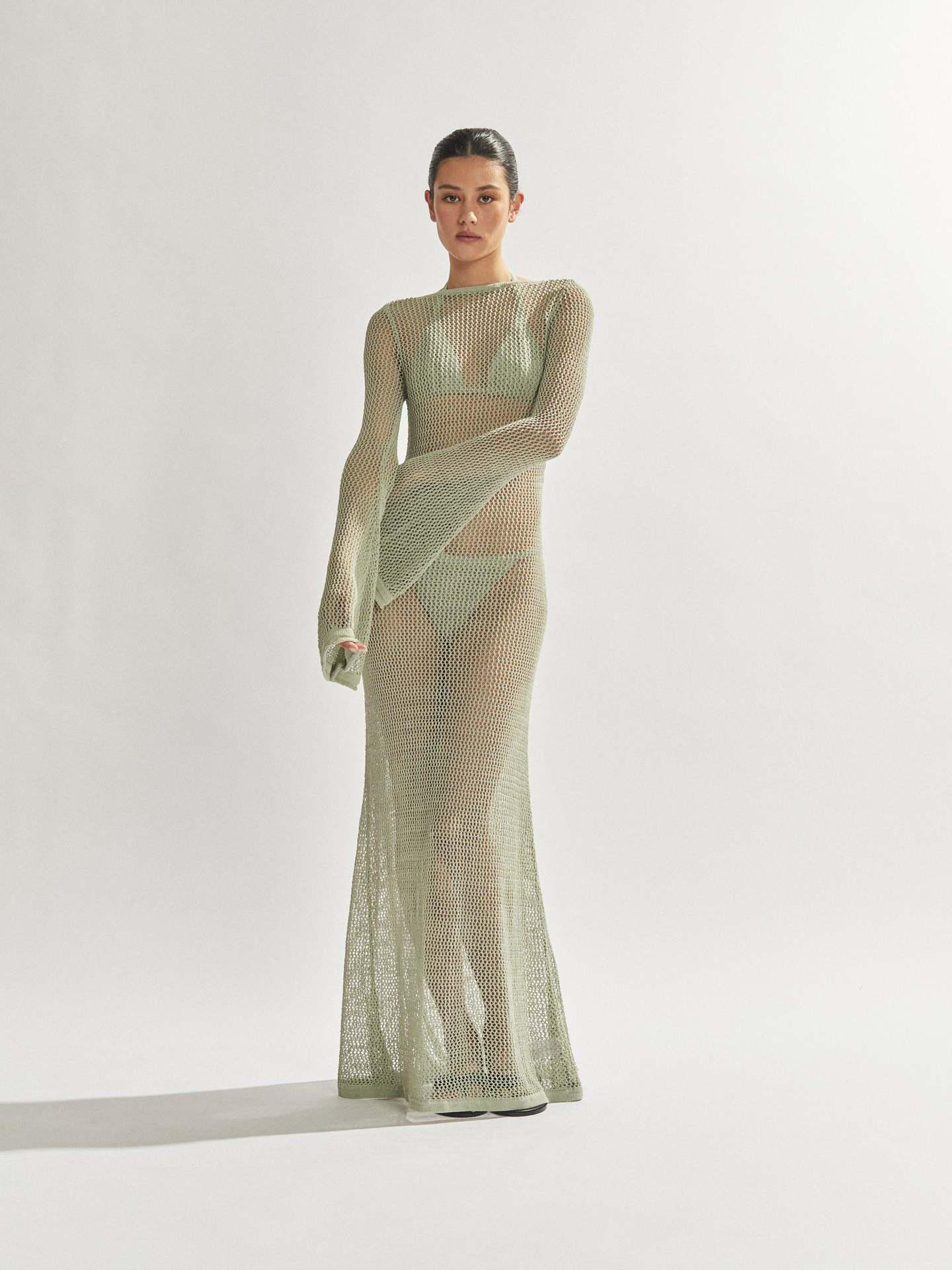 Европейское и американское женское летнее вязаное платье с открытой спиной, длинными рукавами и прозрачное до пола Large зелёный
Европейское и американское женское летнее вязаное платье с открытой спиной, длинными рукавами и прозрачное до пола Large зелёный