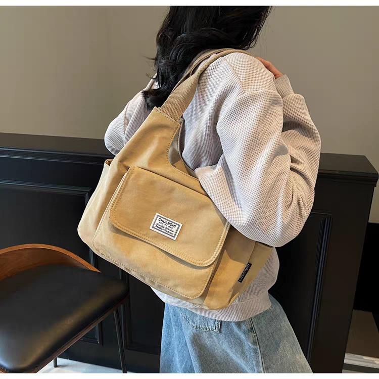 Japanese Commuter Canvas Bag Women s Large-capacity Portable Tote All-matching Casual One-shoulder Underarm 32x14x23 хакі
Japanese Commuter Canvas Bag Women s Large-capacity Portable Tote All-matching Casual One-shoulder Underarm 32x14x23 хакі