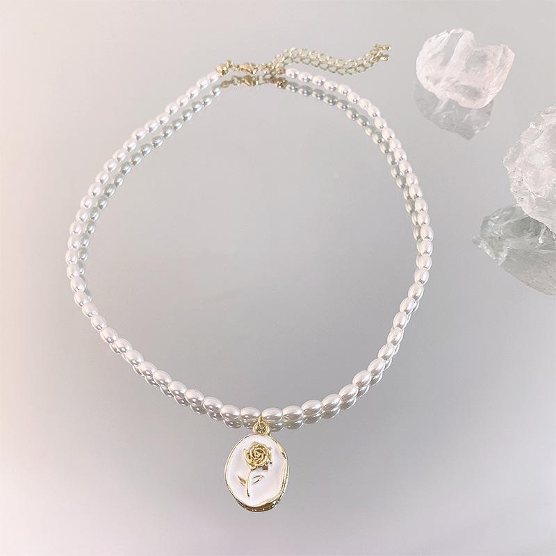 French Pearl Rose Pendant Necklace Women S Light Luxury Niche Design Sense Premium Collarbone Chain
French Pearl Rose Pendant Necklace Women S Light Luxury Niche Design Sense Premium Collarbone Chain