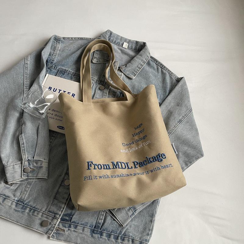 Letter printed canvas shoulder bag women s large capacity tote bag lazy wind travel cloth bag commuter work tote bag хакі
Letter printed canvas shoulder bag women s large capacity tote bag lazy wind travel cloth bag commuter work tote bag хакі