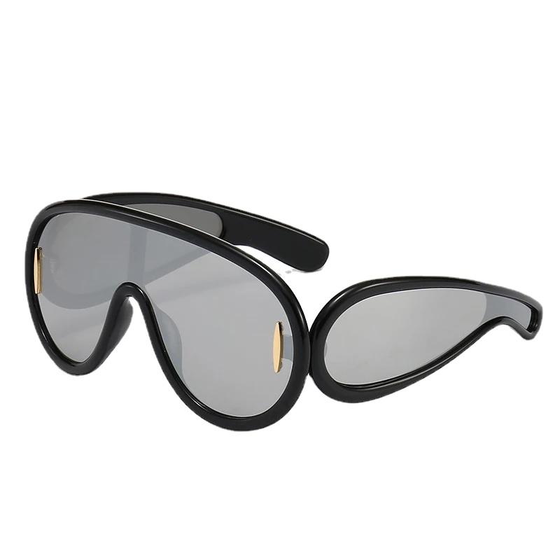Oversized Y2K Punk One-Piece Sun Glasses Ladies Sports Wave Mask Sun Glasses for Lady Luxury Steampunk Eyewear Goggle As shown in Figure
Oversized Y2K Punk One-Piece Sun Glasses Ladies Sports Wave Mask Sun Glasses for Lady Luxury Steampunk Eyewear Goggle As shown in Figure