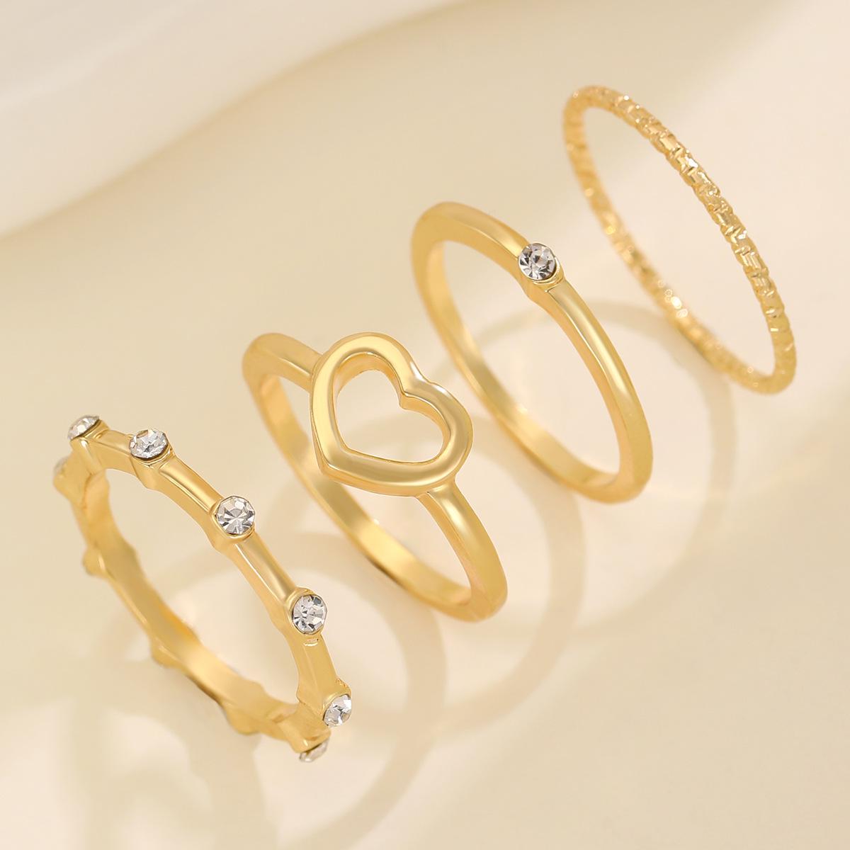 European & American Fashion Heart Inlaid Diamond Ring Set: Versatile Hollow-Out Design for Women
European & American Fashion Heart Inlaid Diamond Ring Set: Versatile Hollow-Out Design for Women