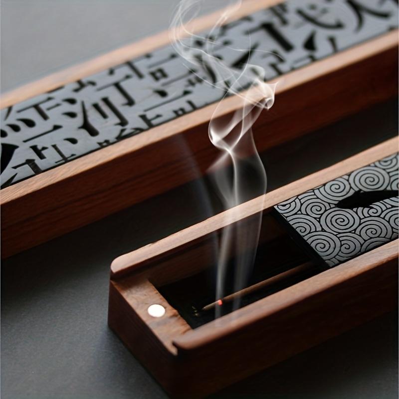 Vintage classic black home incense burner, wooden ebony inlaid incense burner, Chinese wooden hand carved incense burner box.
Vintage classic black home incense burner, wooden ebony inlaid incense burner, Chinese wooden hand carved incense burner box.