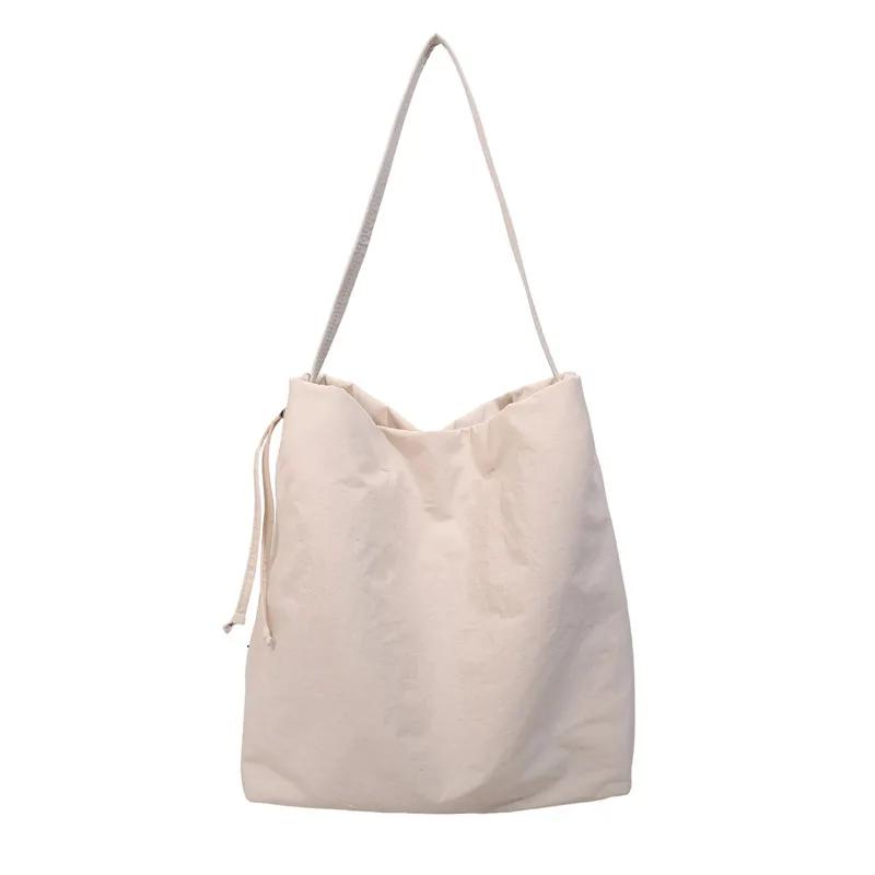 2026 Nyl Solid Color Zipper Simple Casual Versatile Tote Bags Large Capacity for Daily Commuting Simple Shoulder Bags бежевый
2026 Nyl Solid Color Zipper Simple Casual Versatile Tote Bags Large Capacity for Daily Commuting Simple Shoulder Bags бежевый