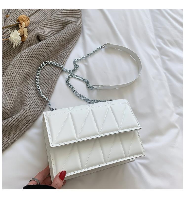 Женская маленькая квадратная сумка с ромбовидной цепочкой 2024 года, новая маленькая квадратная сумка из искусственной кожи, корейская версия, простая и модная сумка на одно плечо с косым креплением белый
Женская маленькая квадратная сумка с ромбовидной цепочкой 2024 года, новая маленькая квадратная сумка из искусственной кожи, корейская версия, простая и модная сумка на одно плечо с косым креплением белый