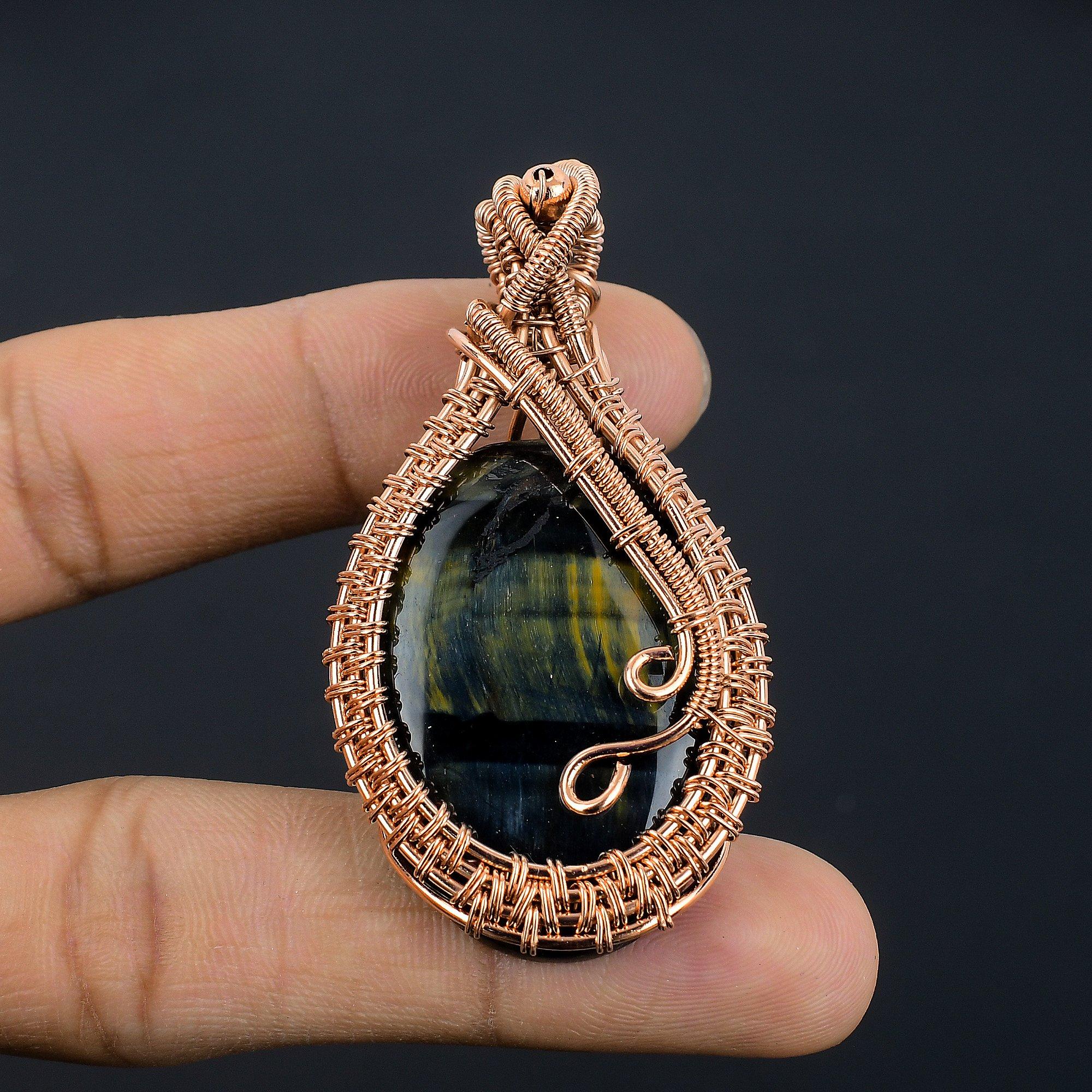 Подвеска из голубого тигрового глаза, подвеска, обернутая медной проволокой 999 пробы. Подарок для женщин, подвеска ручной работы, ювелирные изделия из драгоценных камней 2.55 Inches
Подвеска из голубого тигрового глаза, подвеска, обернутая медной проволокой 999 пробы. Подарок для женщин, подвеска ручной работы, ювелирные изделия из драгоценных камней 2.55 Inches