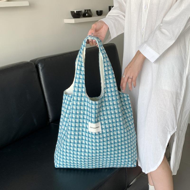 Refreshing lake blue vest bag, fashionable plaid woven portable shoulder bag, student class cloth bag
Refreshing lake blue vest bag, fashionable plaid woven portable shoulder bag, student class cloth bag
