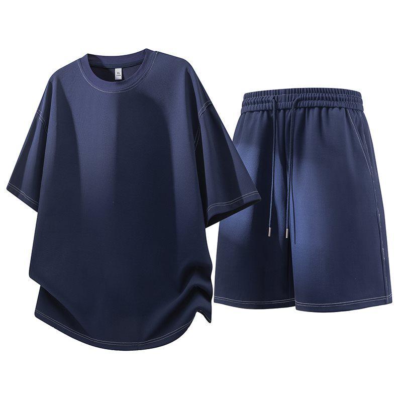 Men s Trendy Summer Sportswear Set: Loose-Fit Short Sleeve & Shorts M темно-синього кольору
Men s Trendy Summer Sportswear Set: Loose-Fit Short Sleeve & Shorts M темно-синього кольору