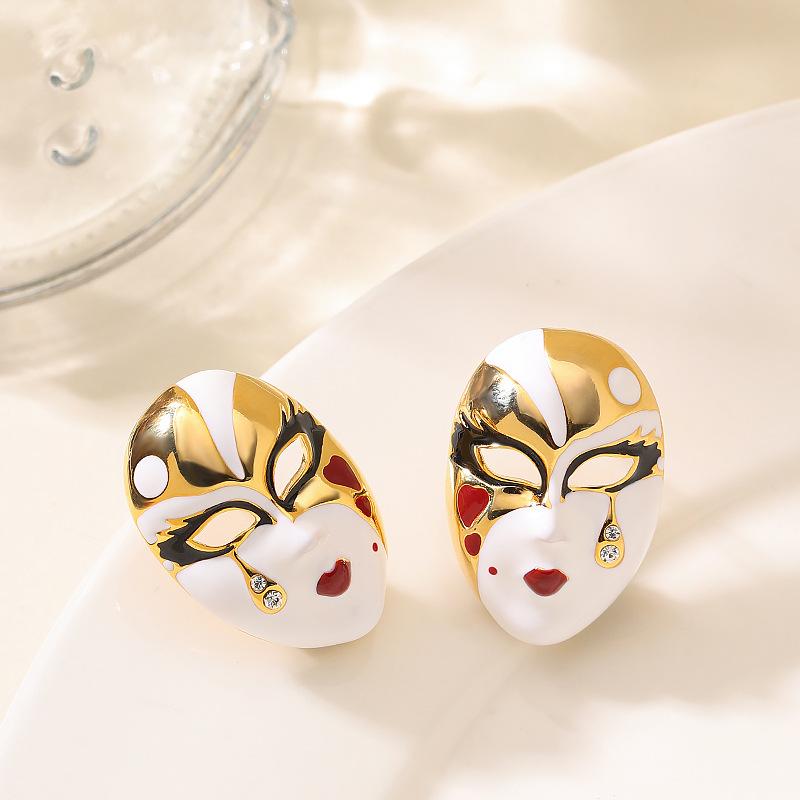 Fashion temperament simple oil drop enamel glaze face mask stud earrings niche personality design earrings золотой
Fashion temperament simple oil drop enamel glaze face mask stud earrings niche personality design earrings золотой