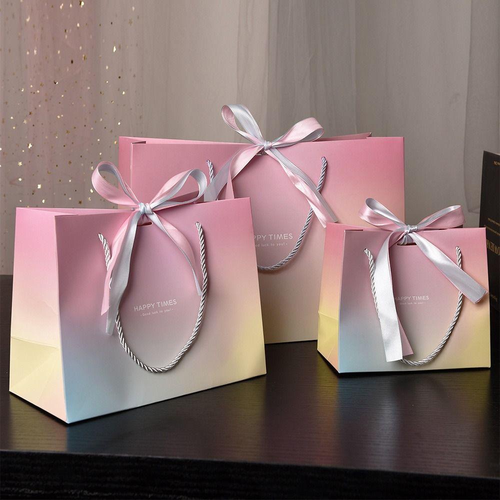 With Bow Ribbon Party Favor Bag Paper Wedding Celebration Present Wrap New Shopping Bags 18X16X10cm
With Bow Ribbon Party Favor Bag Paper Wedding Celebration Present Wrap New Shopping Bags 18X16X10cm