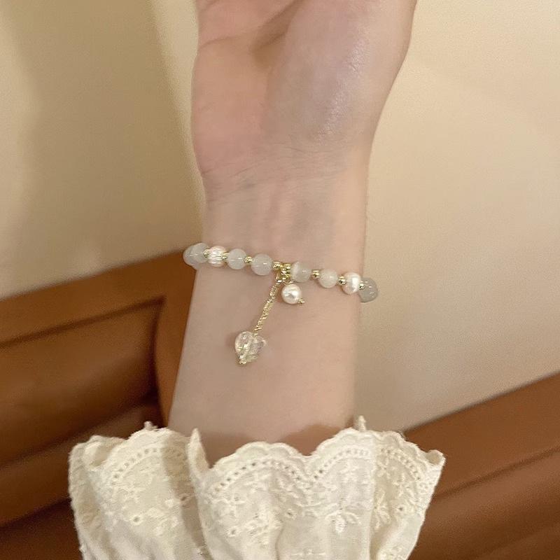 Cat s Eye Pearl Heart Crystal Bracelet: Light Luxury Beaded Jewelry for Women, Spring/Summer Design
Cat s Eye Pearl Heart Crystal Bracelet: Light Luxury Beaded Jewelry for Women, Spring/Summer Design