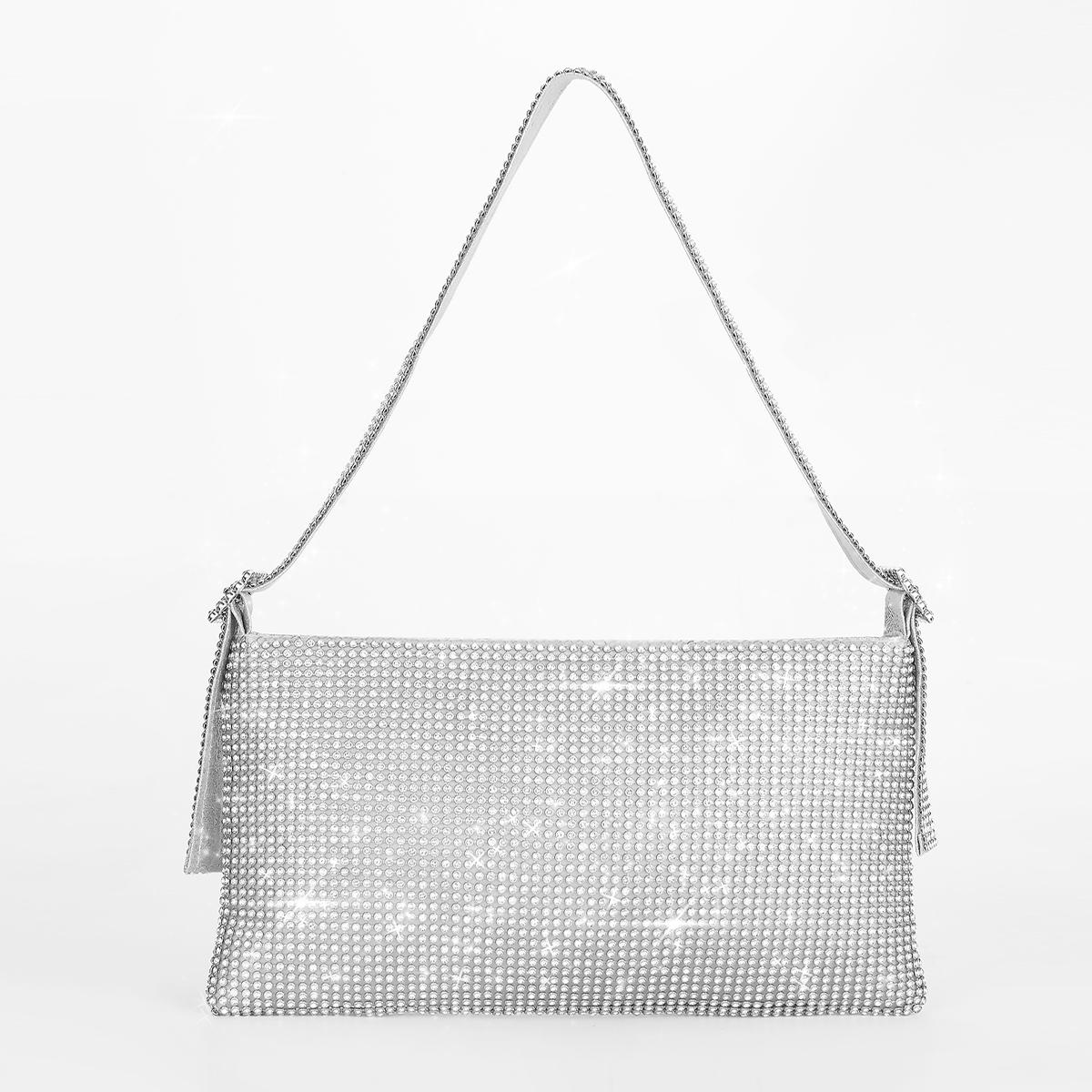 Женская сумка через плечо с квадратной пряжкой и дрелью серебряный
Женская сумка через плечо с квадратной пряжкой и дрелью серебряный