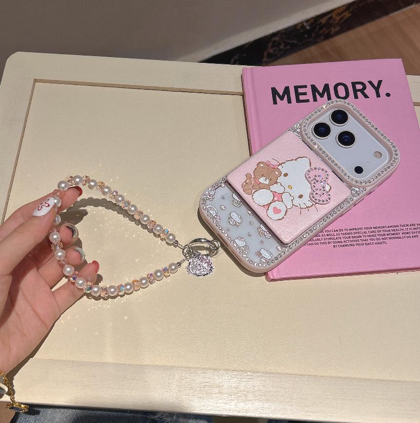 Lux Rhinestone KT Cat iPhone 16/17 Case with Bracelet & Mirror 16
Lux Rhinestone KT Cat iPhone 16/17 Case with Bracelet & Mirror 16