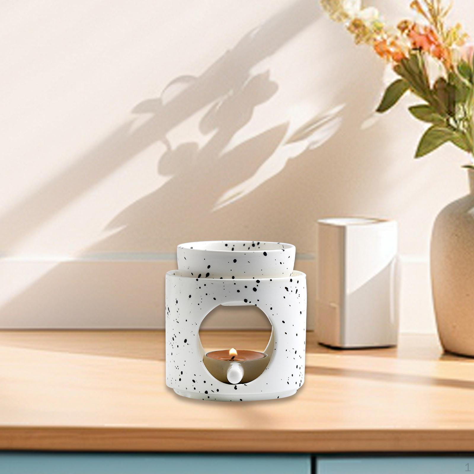 Аромадиффузор, масляная горелка для домашнего использования с подставкой для чайных свечей Black in White
Аромадиффузор, масляная горелка для домашнего использования с подставкой для чайных свечей Black in White