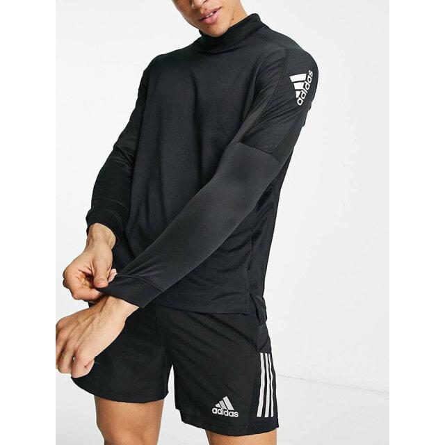 Черная теплая футболка с длинными рукавами и воротником-стойкой adidas Training Strength
Черная теплая футболка с длинными рукавами и воротником-стойкой adidas Training Strength