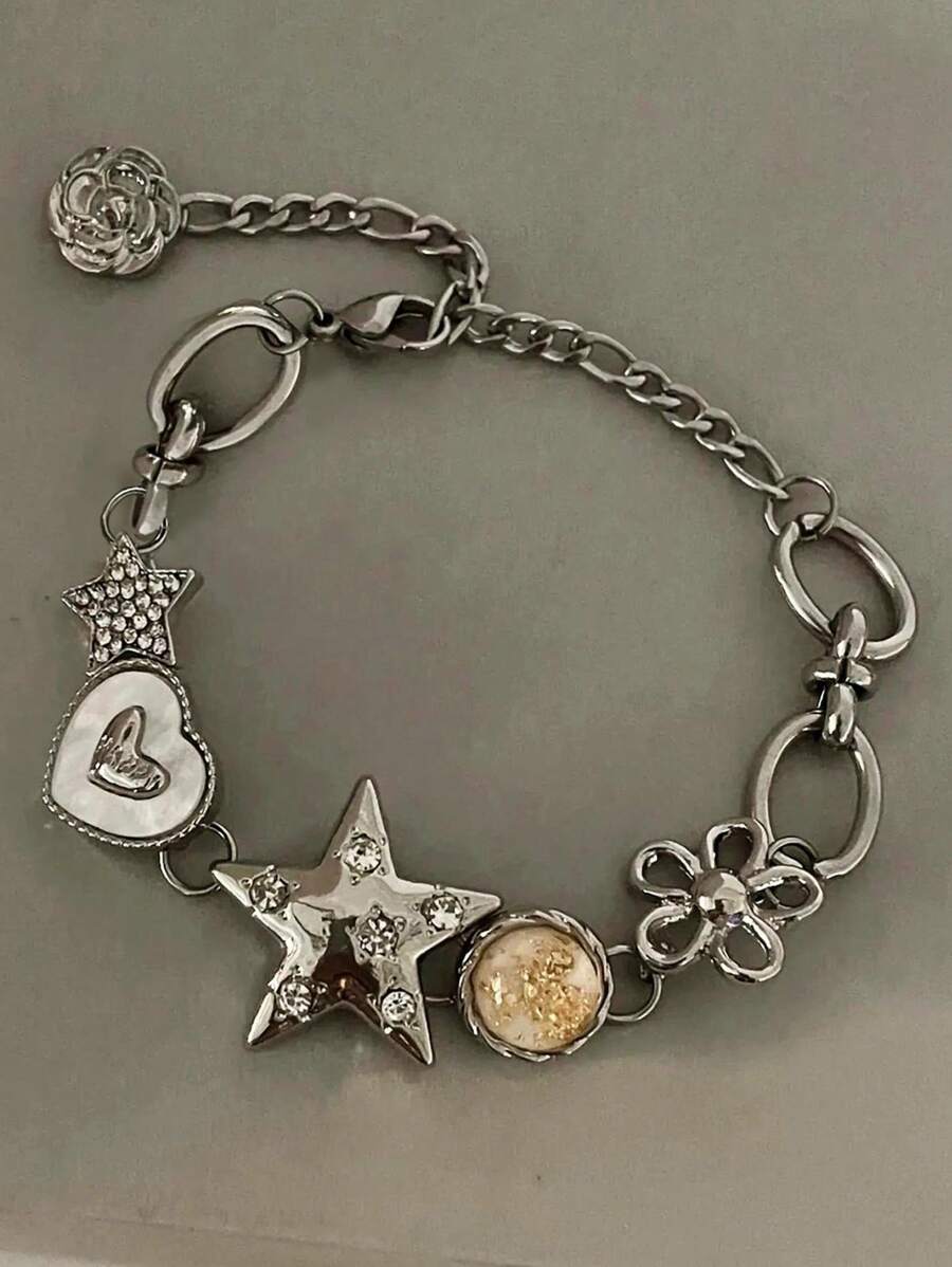 A stylish retro Y2K hip-hop floral rose star strawberry butterfly oil drop heart stainless steel chain bracelet, suitable for everyday wear.
A stylish retro Y2K hip-hop floral rose star strawberry butterfly oil drop heart stainless steel chain bracelet, suitable for everyday wear.