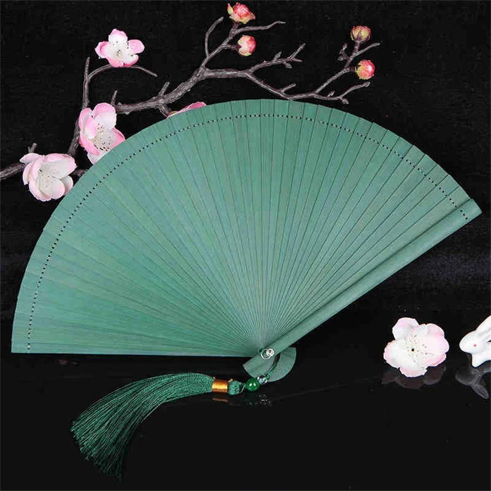 Exquisite Solid Color Bamboo Fan Portable Kimono Fan Tassel Folding Fan Home Decoration темно-зелений колір
Exquisite Solid Color Bamboo Fan Portable Kimono Fan Tassel Folding Fan Home Decoration темно-зелений колір