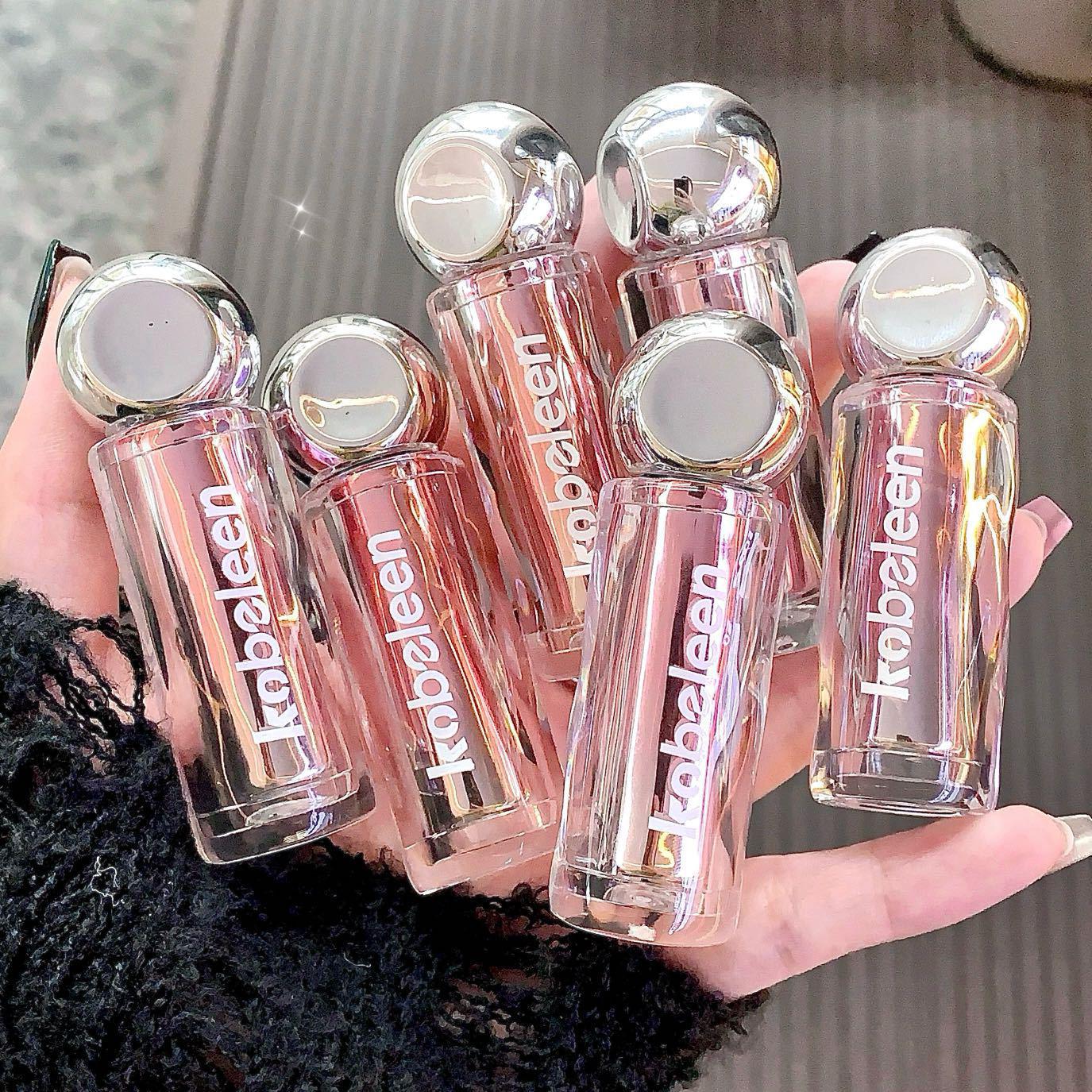Kobeleen Pure Desire Hydrating Lip Gloss C429 - Mirror Finish, Long-Lasting Plump Effect, Whitening Nectar. 2g
Kobeleen Pure Desire Hydrating Lip Gloss C429 - Mirror Finish, Long-Lasting Plump Effect, Whitening Nectar. 2g