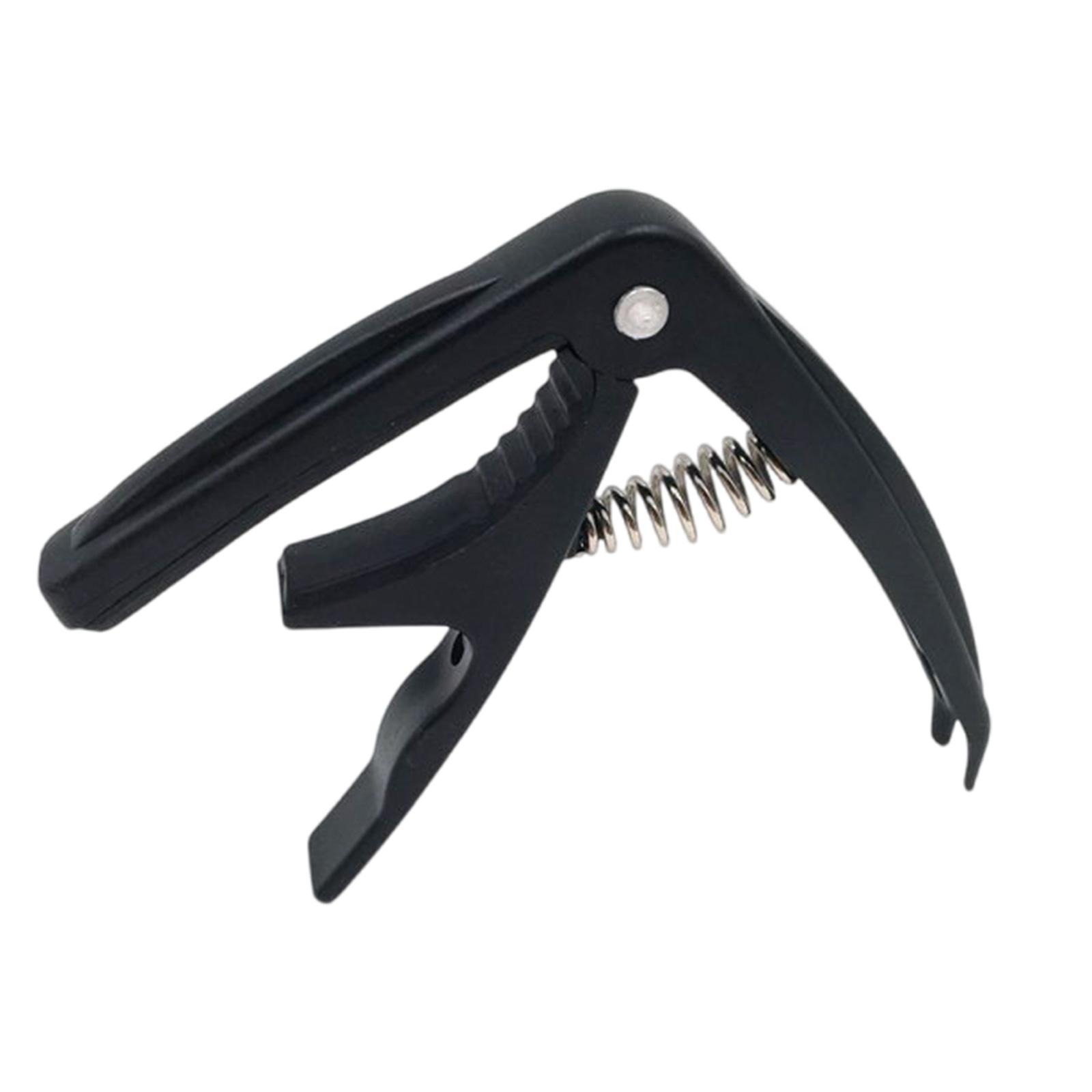 Universals Guitar Tunings Clamp Quick Change Guitar Capo Clip Nonslip Tone Clip for Acoustics, Folk, Electric Guitar 1
Universals Guitar Tunings Clamp Quick Change Guitar Capo Clip Nonslip Tone Clip for Acoustics, Folk, Electric Guitar 1