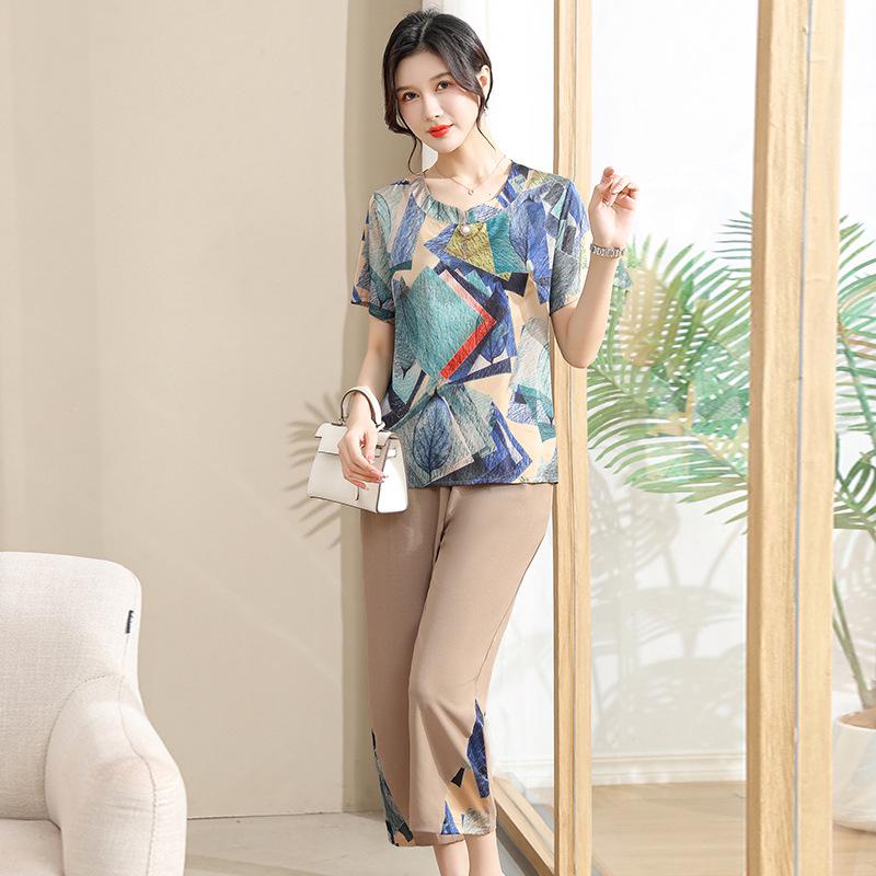 Stylish Summer Set: Middle-Aged Women s Plus-Size Short Sleeve Top and Loose Two-Piece Outfit XL (85-100 kg) синій
Stylish Summer Set: Middle-Aged Women s Plus-Size Short Sleeve Top and Loose Two-Piece Outfit XL (85-100 kg) синій