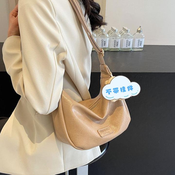 Niche underarm bag women 2025 new fashion retro dumpling bag high-end sense versatile single shoulder messenger bag хаки
Niche underarm bag women 2025 new fashion retro dumpling bag high-end sense versatile single shoulder messenger bag хаки