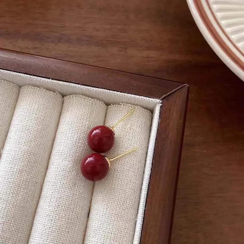 Korean Red Pearl Stud Round Earrings for Women Vintage Sweet Imitation Pearl Temperament Earings Wedding Party Jewelry Gifts
Korean Red Pearl Stud Round Earrings for Women Vintage Sweet Imitation Pearl Temperament Earings Wedding Party Jewelry Gifts