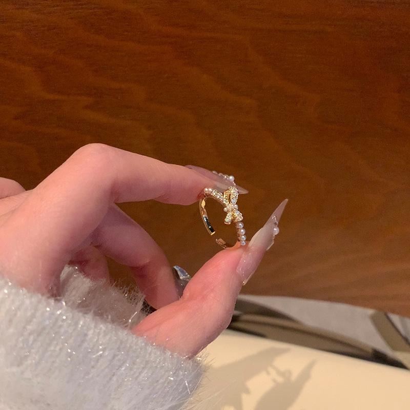 14K zircon bow pearl opening ring light luxury niche high-end temperament versatile jewelry
14K zircon bow pearl opening ring light luxury niche high-end temperament versatile jewelry