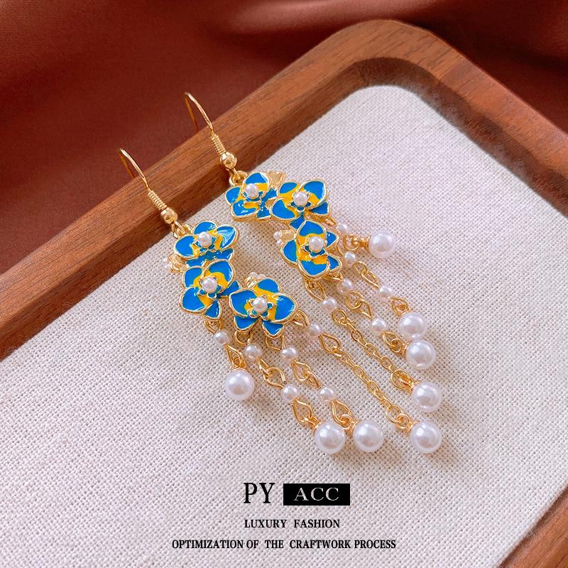 2024 Flower Drip Pearl Tassel Earrings – Retro, High-End, Versatile Ear Hooks for Women
2024 Flower Drip Pearl Tassel Earrings – Retro, High-End, Versatile Ear Hooks for Women