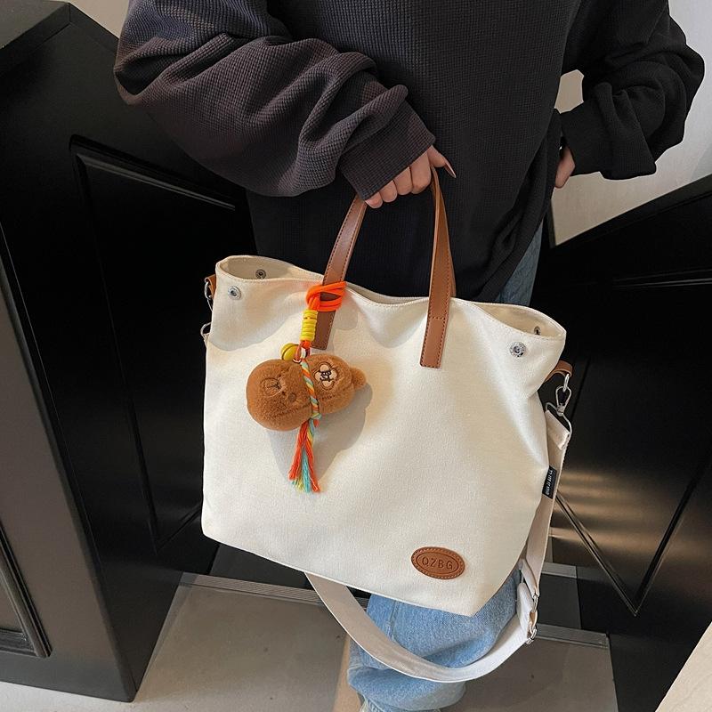 Cross-border large-capacity handbag women s 2025 new student class simple shoulder bag casual versatile messenger bag single package бежевий
Cross-border large-capacity handbag women s 2025 new student class simple shoulder bag casual versatile messenger bag single package бежевий