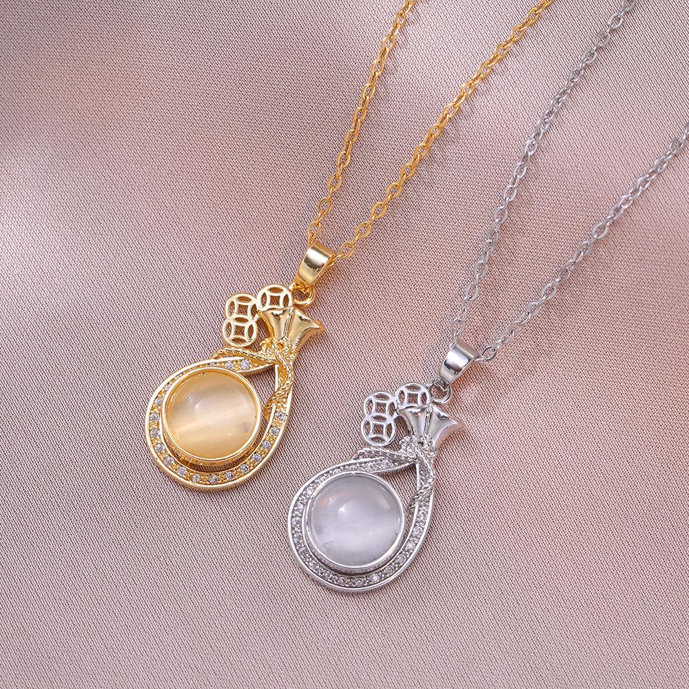 Women s Influencer Necklace: Cat s Eye Stone Rotating Pendant with Clavicle Chain Design
Women s Influencer Necklace: Cat s Eye Stone Rotating Pendant with Clavicle Chain Design