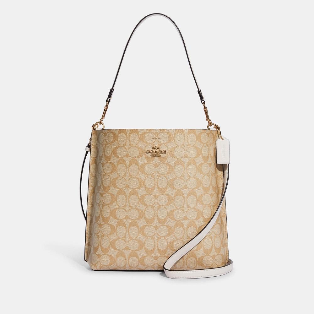 Сумка-ведро Coach Mollie из канвы Signature цвета светло-хаки и золотистого цвета с мелом
Сумка-ведро Coach Mollie из канвы Signature цвета светло-хаки и золотистого цвета с мелом