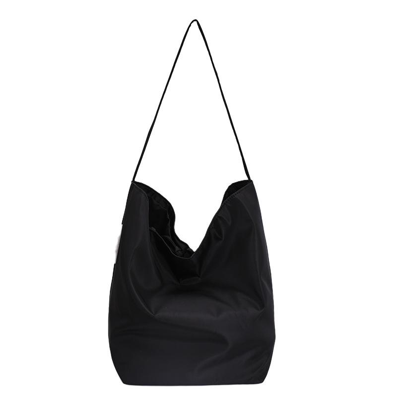 Korean Nylon Large-capacity Shoulder Bag Solid Color Fashion Casual Commuter Tote Bag New Lightweight Soft Women Handbag 43x21x31CM
Korean Nylon Large-capacity Shoulder Bag Solid Color Fashion Casual Commuter Tote Bag New Lightweight Soft Women Handbag 43x21x31CM