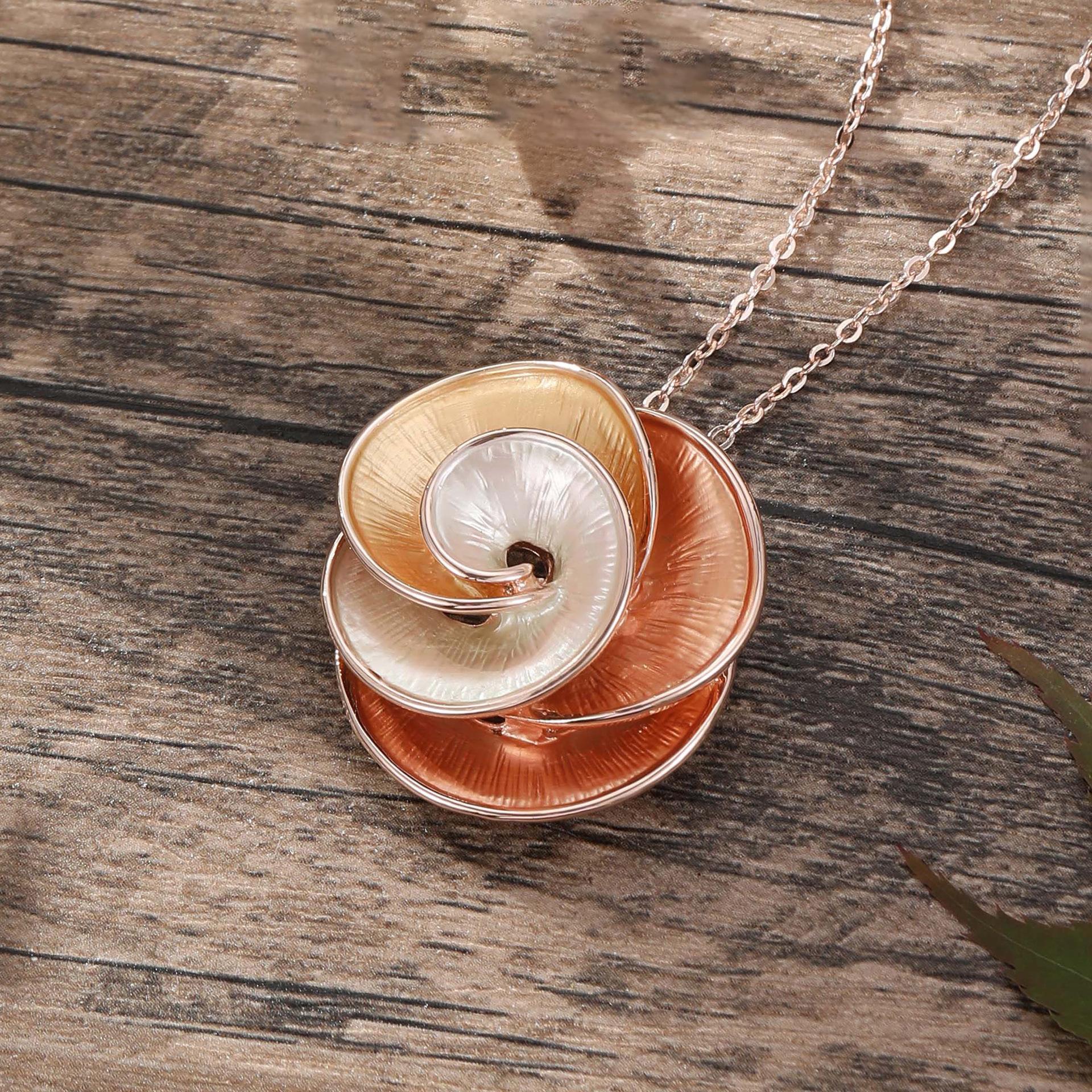 Color painting oil engraved camellia rose flower pendant, fashionable and simple women s versatile flower alloy neck chain
Color painting oil engraved camellia rose flower pendant, fashionable and simple women s versatile flower alloy neck chain