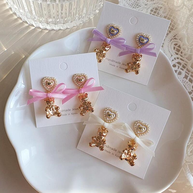 Women s Bear Cubic Ribbon Fashion Earrings A33507_Pink
Women s Bear Cubic Ribbon Fashion Earrings A33507_Pink