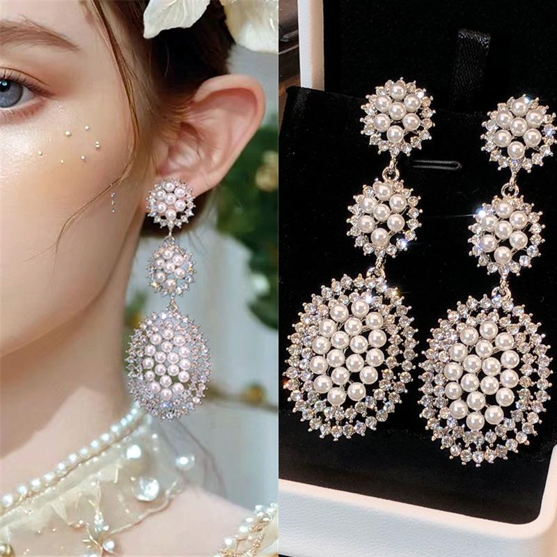 Oval tassel earrings fashion exaggerated stud earrings personalized earrings niche high sense
Oval tassel earrings fashion exaggerated stud earrings personalized earrings niche high sense