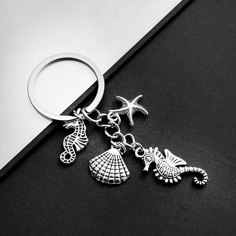 Stylish Marine Anchor Starfish Seahorse Keychain Men Women Guitar Drum Kit Key Ring Soccer Keyholder Silver Color Bag Decoration 8 cm
Stylish Marine Anchor Starfish Seahorse Keychain Men Women Guitar Drum Kit Key Ring Soccer Keyholder Silver Color Bag Decoration 8 cm