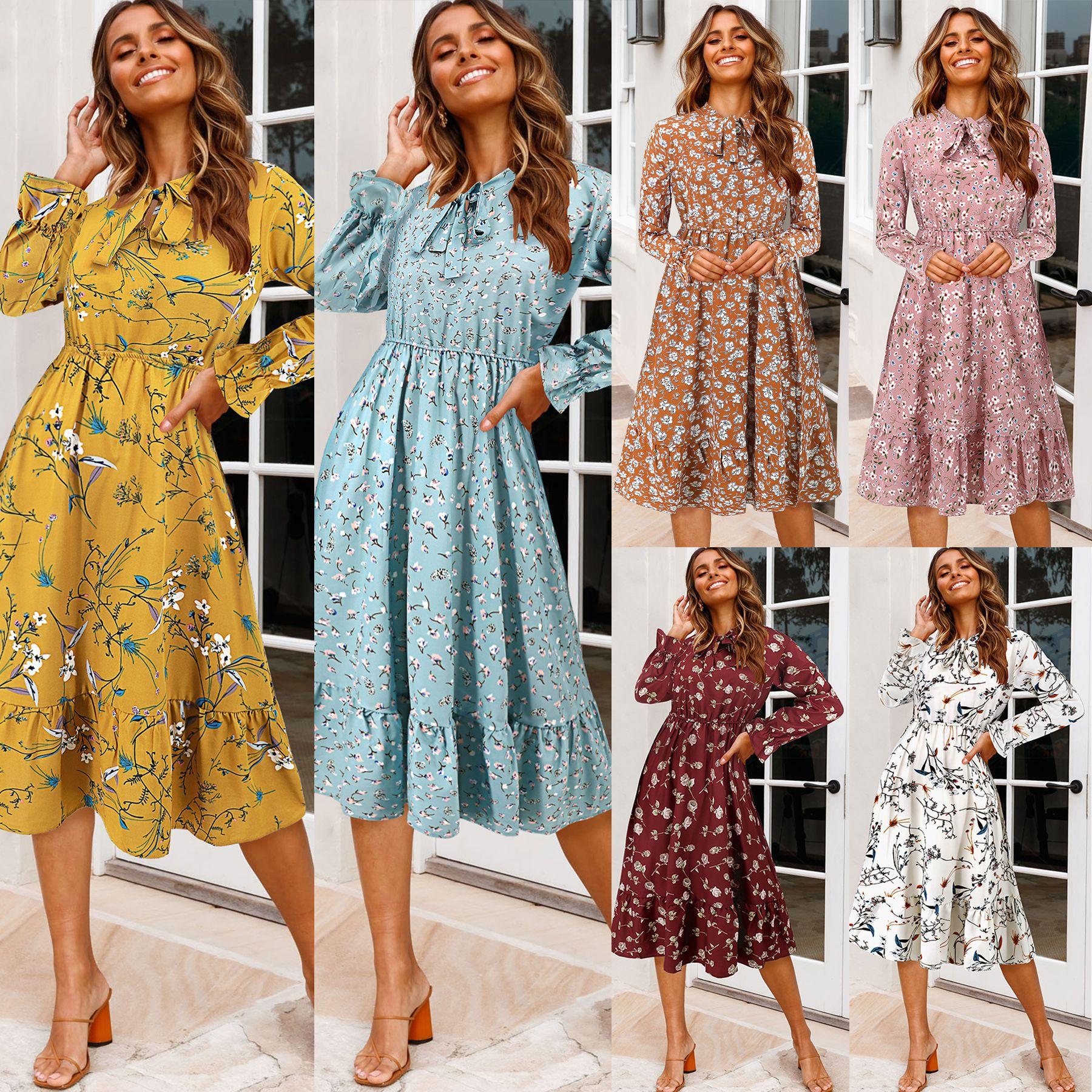 Floral Print Wrap Dress with Long Sleeves and Ruffled S
Floral Print Wrap Dress with Long Sleeves and Ruffled S