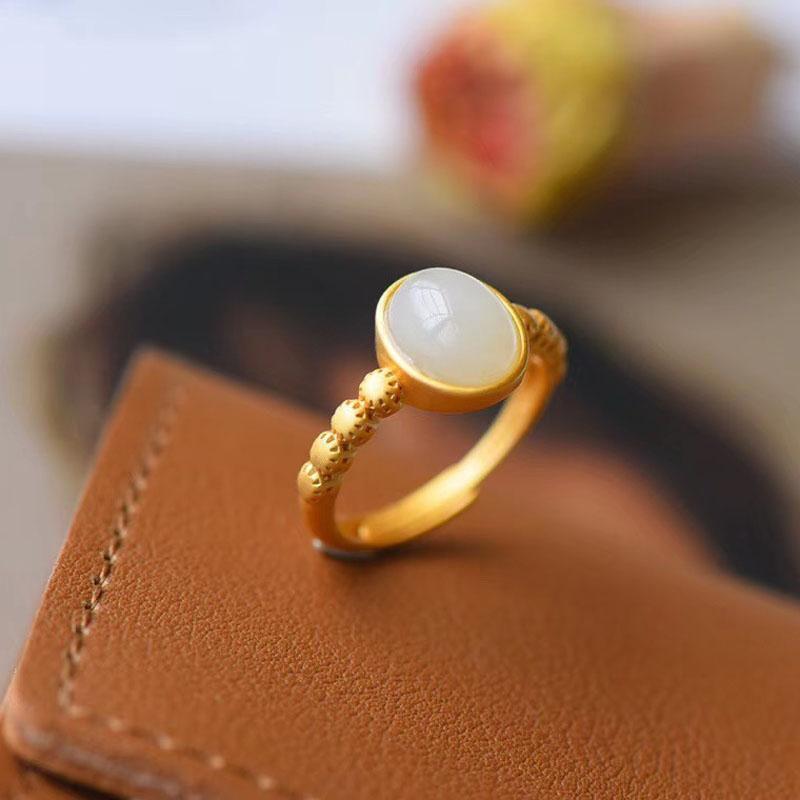 Frosted Hollow Design Women s Ring with Gilt Inlaid Zircon and Natural Imitation Hetian Jade Cabochon Adjustable
Frosted Hollow Design Women s Ring with Gilt Inlaid Zircon and Natural Imitation Hetian Jade Cabochon Adjustable