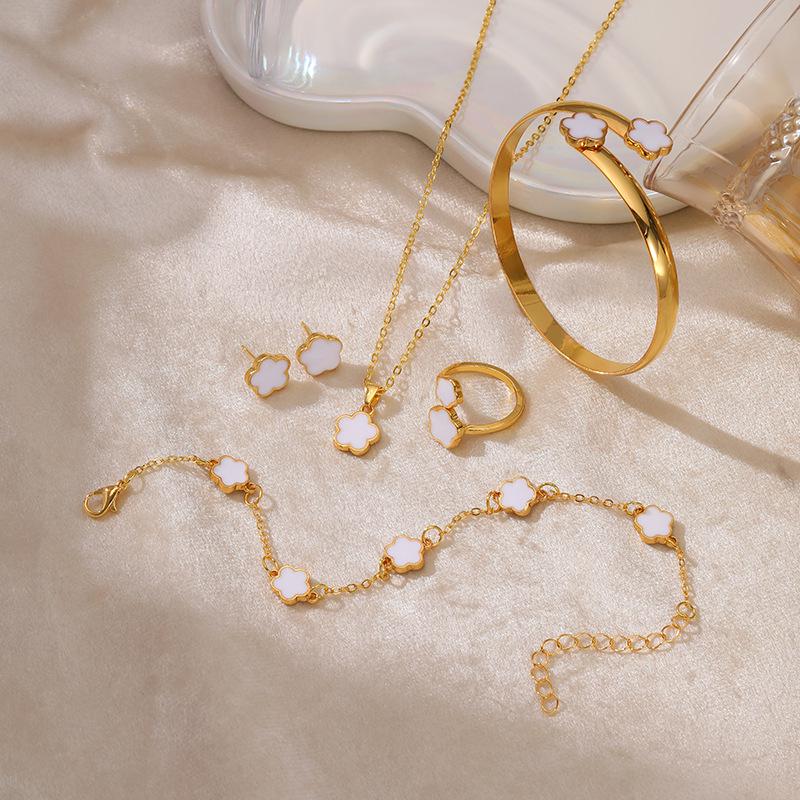 Женский комплект украшений «Пятилистный клевер»: Ожерелье «Счастливый цветок», универсальные серьги и украшения для рук белый
Женский комплект украшений «Пятилистный клевер»: Ожерелье «Счастливый цветок», универсальные серьги и украшения для рук белый