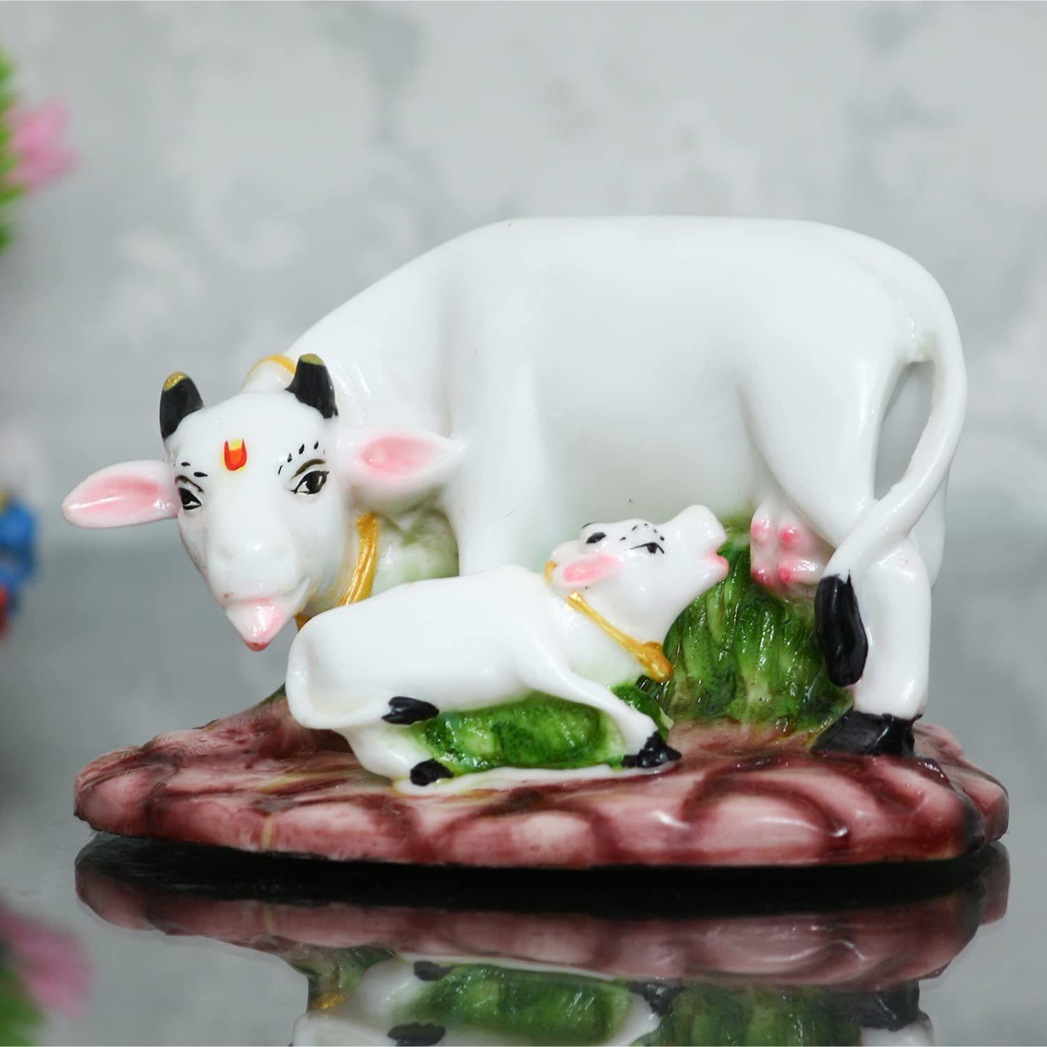 Colorful Cow and Calf Statue Polyresin Statue (12.5 cm x 7.5 cm x 7.5 cm, White and Green)
Colorful Cow and Calf Statue Polyresin Statue (12.5 cm x 7.5 cm x 7.5 cm, White and Green)