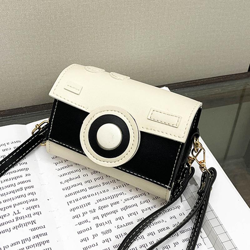 Niche high texture creative personality micro single camera bag women s bag Korean fashion popular shoulder bag чорний
Niche high texture creative personality micro single camera bag women s bag Korean fashion popular shoulder bag чорний