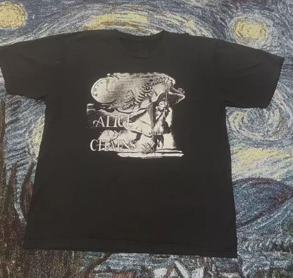 Vintage Alice In Chains Alice In Wonderland Tee T Shirt Black 3XL
Vintage Alice In Chains Alice In Wonderland Tee T Shirt Black 3XL
