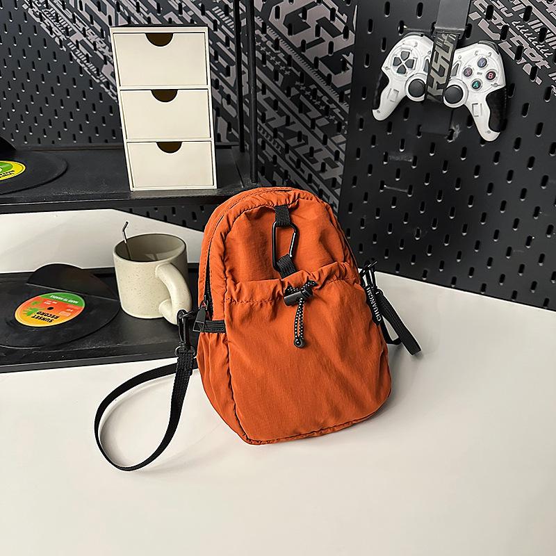 Small and lightweight nylon cloth bag women s new simple outdoor leisure bag shoulder crossbody mobile phone bag оранжевый
Small and lightweight nylon cloth bag women s new simple outdoor leisure bag shoulder crossbody mobile phone bag оранжевый