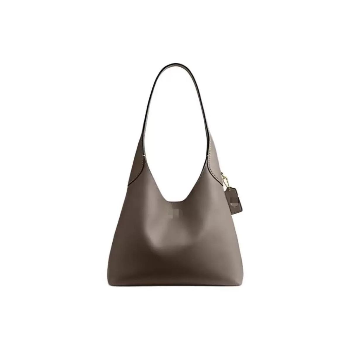 Koujia 2025 New Brooklyn Brooklyn Leather One Shoulder Underarm Commuter Lazy Wind Portable Tote Bag medium size 28*8*28
Koujia 2025 New Brooklyn Brooklyn Leather One Shoulder Underarm Commuter Lazy Wind Portable Tote Bag medium size 28*8*28