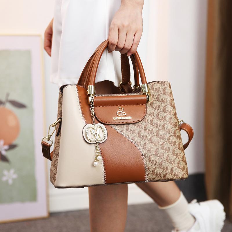 2025 new bag large capacity European and American retro middle-aged mother bag shoulder messenger bag
2025 new bag large capacity European and American retro middle-aged mother bag shoulder messenger bag