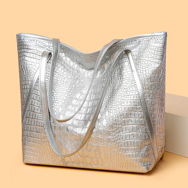 Простая и универсальная сумка-тоут с крокодиловым принтом, большая вместимость, модная сумка, винтажный дизайн, женская сумка через плечо серебряный
Простая и универсальная сумка-тоут с крокодиловым принтом, большая вместимость, модная сумка, винтажный дизайн, женская сумка через плечо серебряный