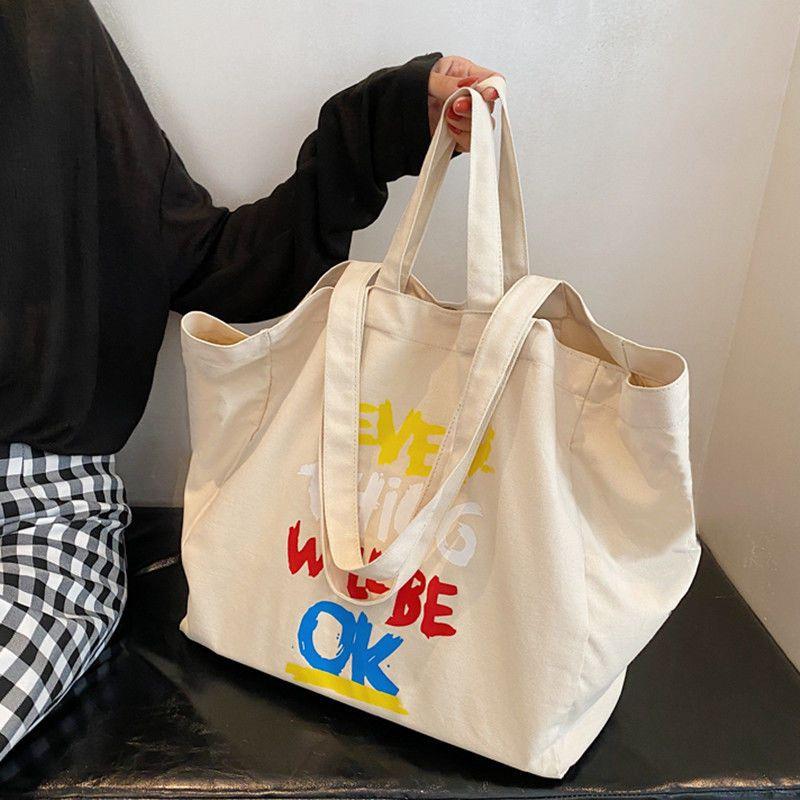 Women Alphabet Canvas Shoulder Bags Female Casual Letter Printed Tote Handbags Large Capacity Cotton Cloth Shopping School Bag
Women Alphabet Canvas Shoulder Bags Female Casual Letter Printed Tote Handbags Large Capacity Cotton Cloth Shopping School Bag