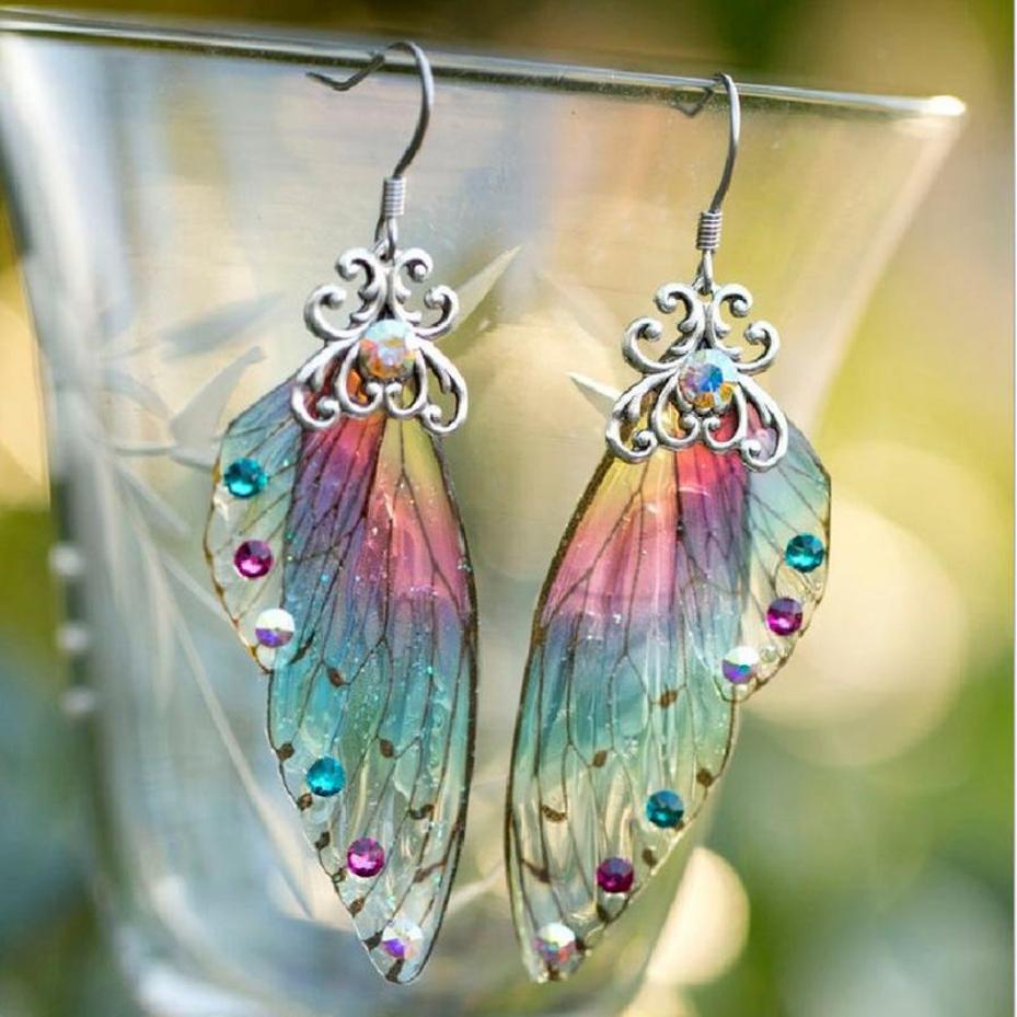 Fairy Rainbow Gradient Resin Butterfly Wing Drop Earrings For Women Rhinestone Glitter Simulation Insect Dangle Earrings Jewelry срібний
Fairy Rainbow Gradient Resin Butterfly Wing Drop Earrings For Women Rhinestone Glitter Simulation Insect Dangle Earrings Jewelry срібний