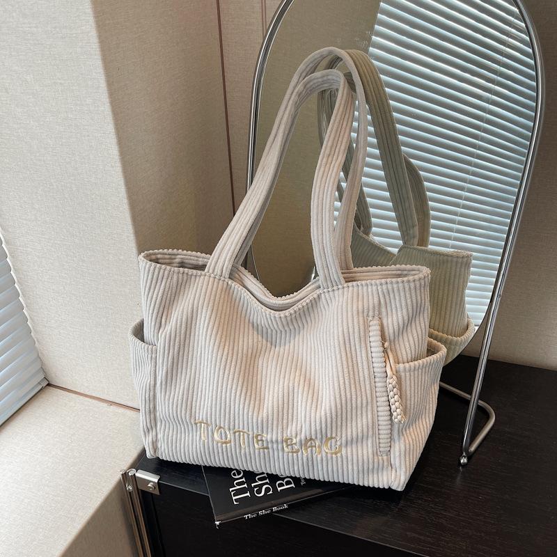 Вельветовая тканевая сумка женская большой вместимости новая осенне-зимняя универсальная наплечная сумка повседневная классическая сумка-тоут бежевый
Вельветовая тканевая сумка женская большой вместимости новая осенне-зимняя универсальная наплечная сумка повседневная классическая сумка-тоут бежевый